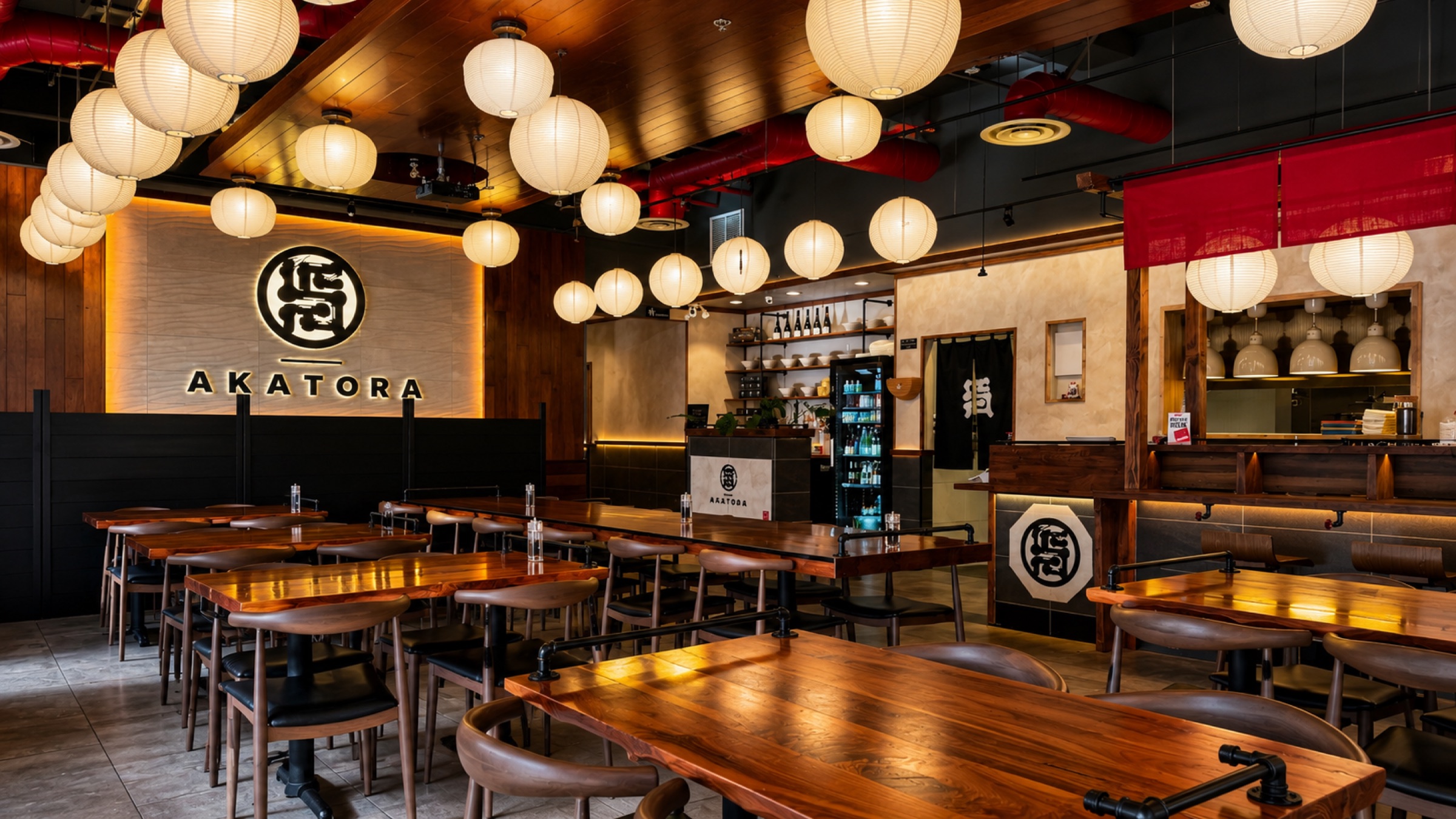 Akatora Ramen dining room with the illuminated tiger seal wall and paper lanterns